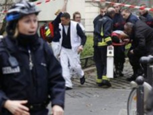 parizSi-Jurnalis-Charlie-Hebdo-redaqciaze-Tavdasxmas-msoflio-liderebi-gmoben
