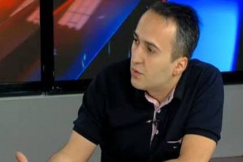 ruseTis-moqalaqe-grigol-vaSaZe-ras-ambobs-TeTr-saxlTan-miaxloebis-gamo-dapatimrebul-amerikis-moqalaqeebze