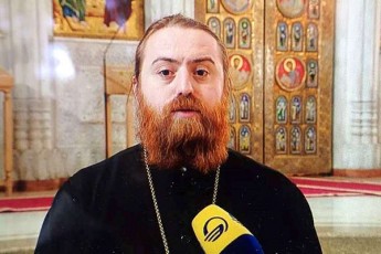 arqimandriti-iovane-mWedliSvili-gavrcelebul-Canawerebze-gamodis-rom-eklesia-romelmac-qveyana-2000-weli-atara-yvelaze-didi-safrTxea---es-erTmaneTSi-ver-jdeba