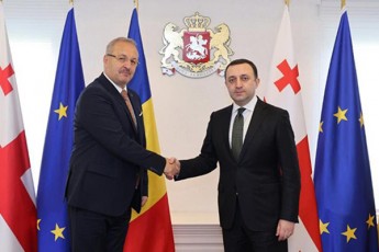 premier-ministri-irakli-RaribaSvili-rumineTis-erovnuli-Tavdacvis-ministr-vasile-dinkus-Sexvda