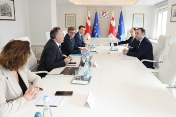irakli-RaribaSvili-ADP-jgufis-vice-prezidents-edvard-orqraiTs-Sexvda-franguli-kompania-Tav-Airports-is-aqciebis-mflobeli-gaxda